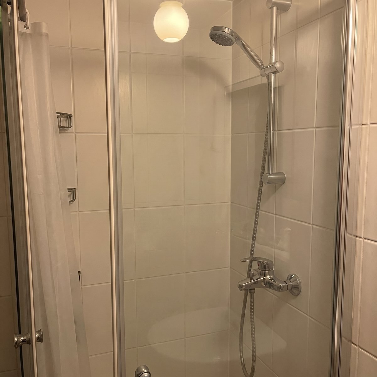 The same shower after cleaning, bright and clear